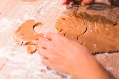 Cropped hand of person holding heart shape