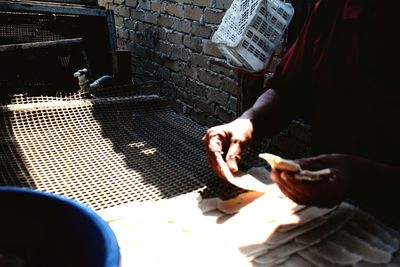 High angle view of people sitting on chair