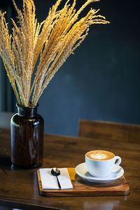 Close-up of coffee cup on table