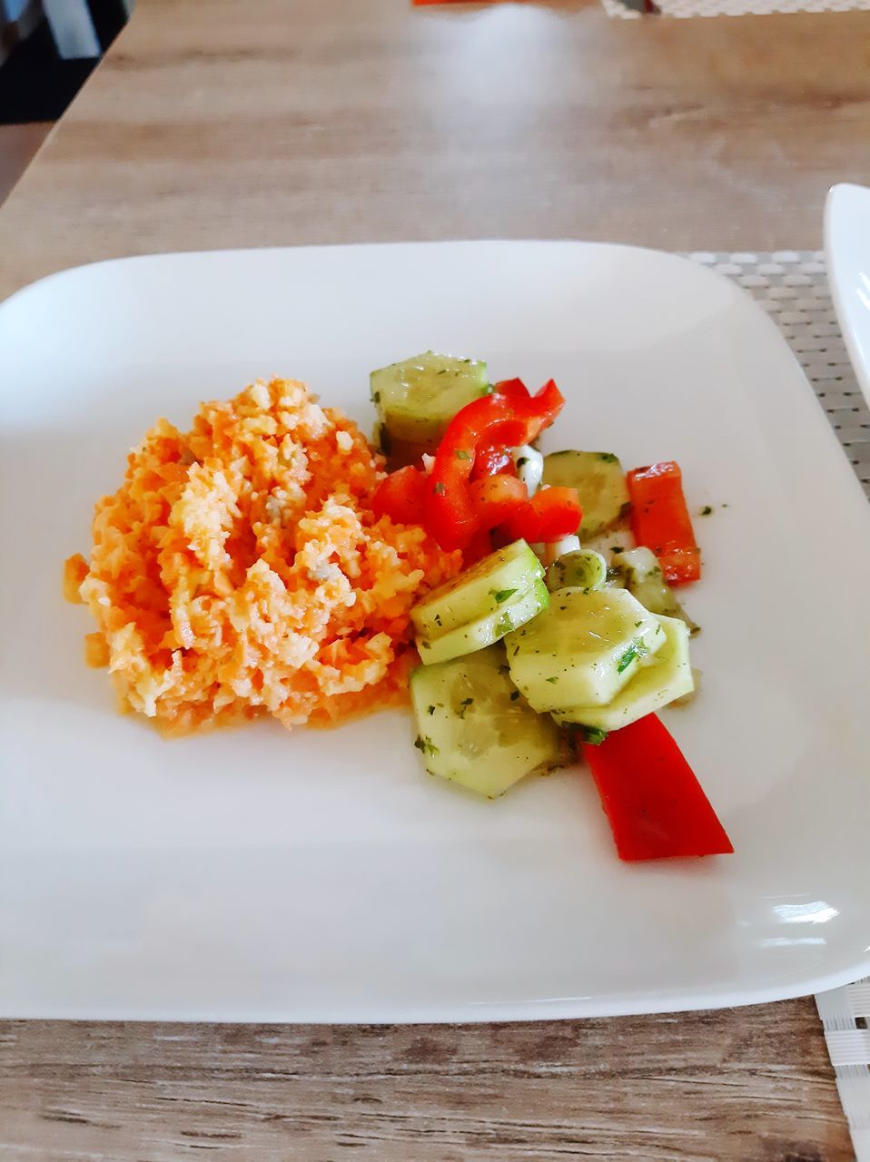 CLOSE-UP OF FOOD SERVED ON TABLE