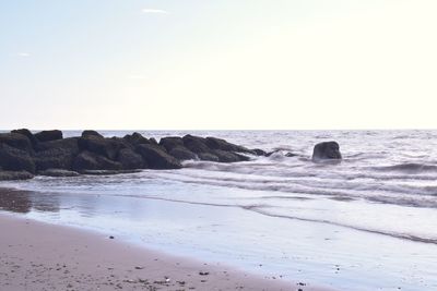 Scenic view of sea against clear sky