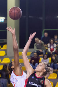 Group of people playing with ball