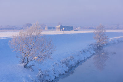 Scenic view of snow covered landscape