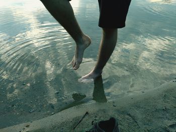 Low section of people on beach