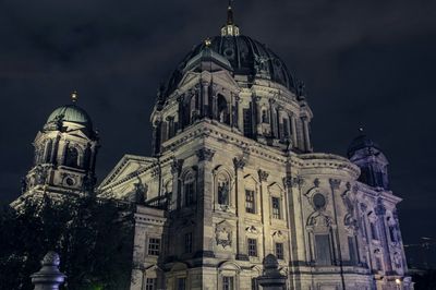 Low angle view of berlin cathedral at night against sky