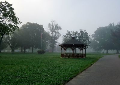 Gazebo on field against sky