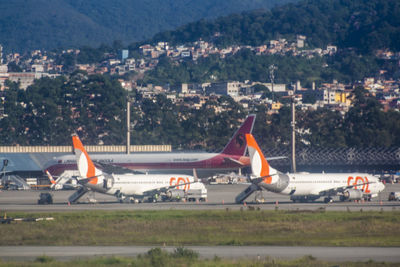 Airplane flying over airport