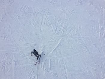 High angle view of people skiing on snow