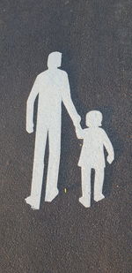 High angle view of information sign on road