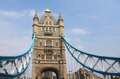 Low angle view of tower bridge against sky 