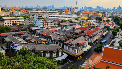 High angle view of street and buildings in city