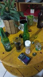 High angle view of bottles on table