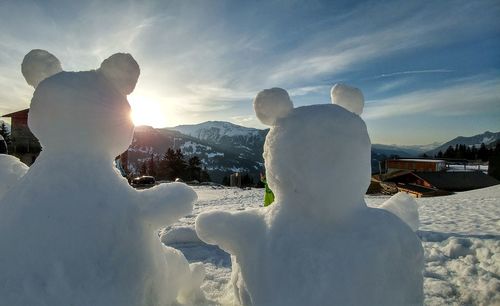 Panoramic view of mountains against sky during winter