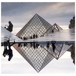 Tilt image of building against sky
