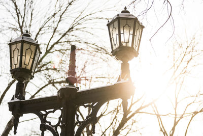 Low angle view of street light against sky