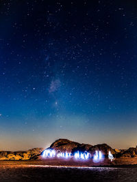 Scenic view of illuminated star field against sky at night