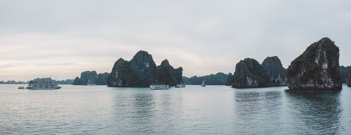 Panoramic view of bay against sky