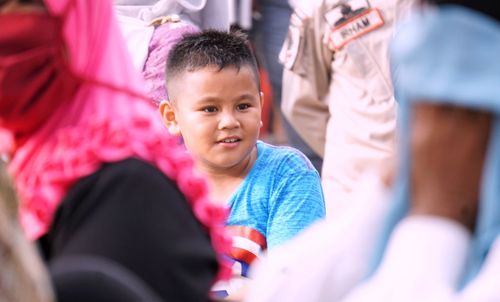 Portrait of little boy looking away