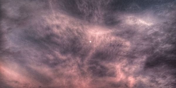 Low angle view of dramatic sky at night