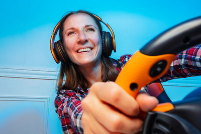 Portrait of young woman working at home