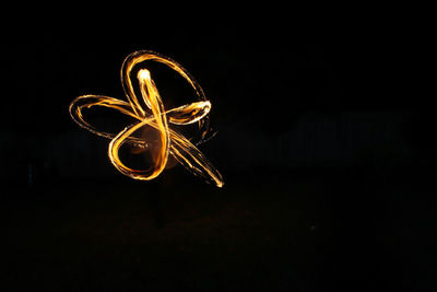 Light painting against black background