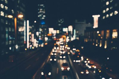 Defocused image of city traffic by night
