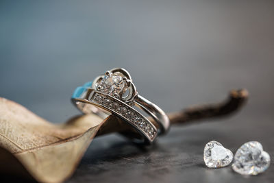 Close-up of wedding rings on white background