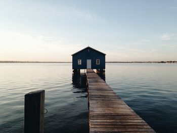 Peaceful mornings by the blue boat house at crawley, perth