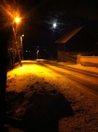 Illuminated street light at night