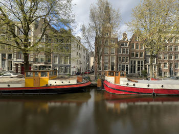 Boats moored at harbor
