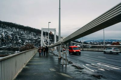 Bridge over road in rain