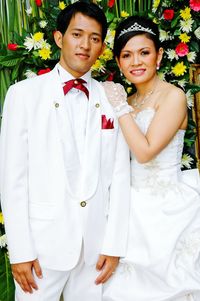 Portrait of bride and bridegroom standing during wedding ceremony