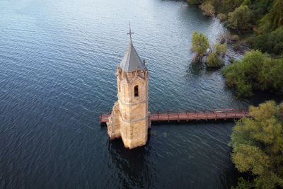 High angle view of temple by lake
