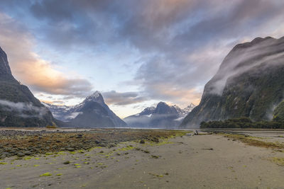 Scenic view of snowcapped mountains against sky during sunset