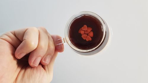 Close-up of woman holding drink