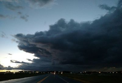 Road against cloudy sky