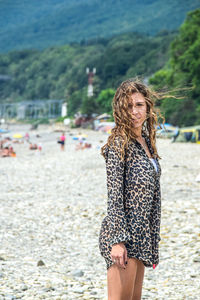 Woman standing at beach