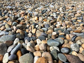 Full frame shot of pebbles on beach