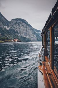 Boat on river against sky