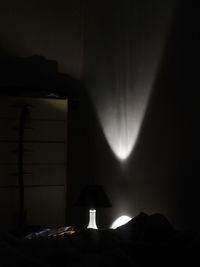 View of illuminated dark room