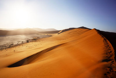 Scenic view of desert against sky