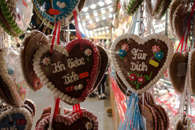 Close-up of heart shape decorations for sale at market stall