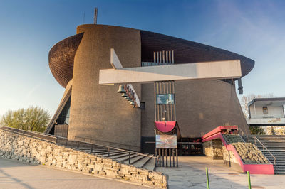 Staircase of building against sky in city
