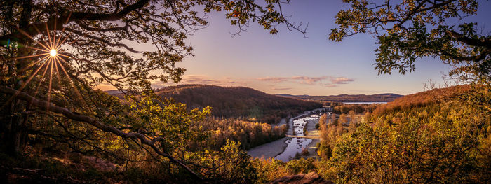 Scenic view of landscape against sky during sunset