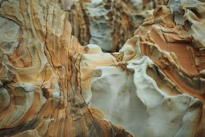 Close-up of statue against rock