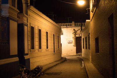 Illuminated street at night