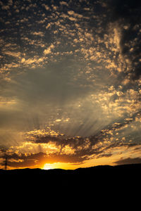 Scenic view of dramatic sky during sunset