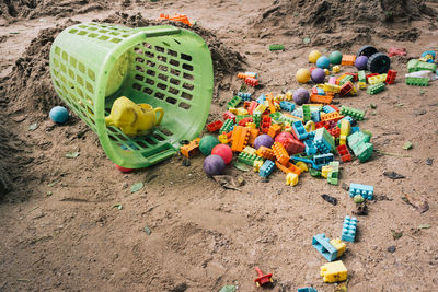 High angle view of toys on beach