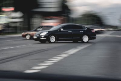 Cars on street in city