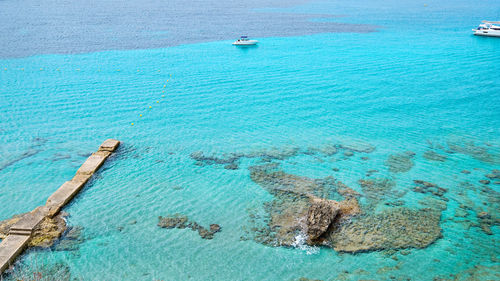 Aerial view of sailboat in sea